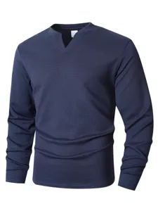 Detailed view of the waffle knit V-neck texture and collar craftsmanship on the men's long sleeve.