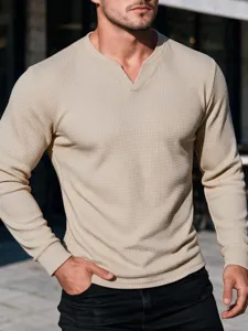 Detailed close-up showing the waffle knit texture and V-neck of the men's long sleeve top.