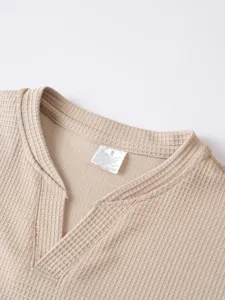 Waffle knit v-neck long sleeve t-shirt collar and inner wash label detail view photo.