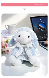 Peluche lapin bleu style Lolita avec bonnet en dentelle et position assise pour cadeau.
