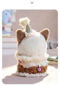 Detailed close-up of a creative birthday cake plush toy with cute animal ears and party hat.