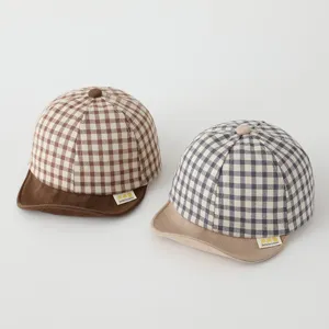 Chic plaid baby baseball cap with soft brim, cute sun hat for spring and autumn infant boys girls.