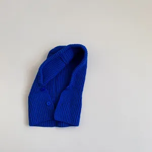Kids solid color knit hooded scarf, cozy winter warm one-piece hat shawl detail view.