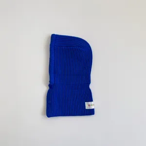 Royal blue knit children balaclava close-up view, warm winter hooded scarf detail display.