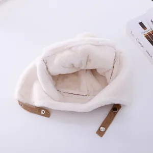 Kids winter warm plush earflap hat with soft fleece material and brown strap details.