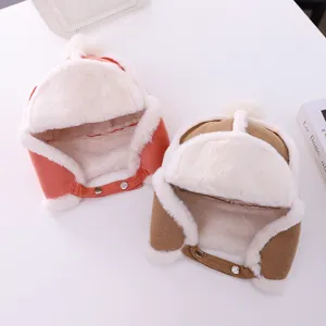 Children plush earflap winter hat detail view, cozy warm fleece lined cute design.