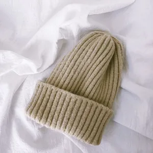 Comfortable solid color kids knit beanie hat, soft wool winter warm cap for boys and girls daily wear.
