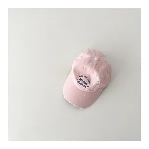 Pink cotton baby baseball cap with frayed edge and chic letter embroidery for children spring.