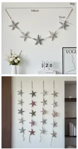 Detailed view of ocean style fabric starfish hanging garland for kids room wall decor.