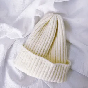 Cozy knitted beanie detail, soft solid color wool hat for kids, warm winter daily wear.