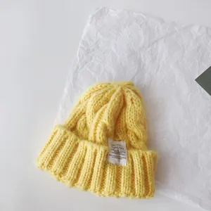 Children's yellow cable knit beanie hat with cute fabric label, warm winter pullover hat kids.