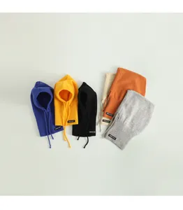 Children winter knitted balaclava hat, warm one-piece hooded bib in multiple vibrant colors.