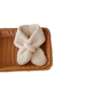 Kids minimalist knitted cross scarf baby winter warm solid color neck warmer main view