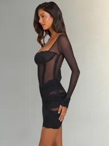 Close-up detail of sheer mesh lace long sleeve bodycon dress showing corset boning and ruched design.