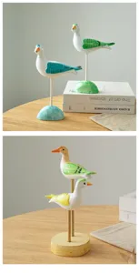 Mediterranean seagull wooden carved desktop ornament, handmade painted art bird decor detail.