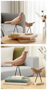 Detailed view of rustic wooden bird figurines on metal legs, perfect for modern home decor.