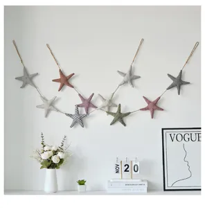 Ocean style fabric starfish wall hanging detail, cute striped and polka dot hanging decor