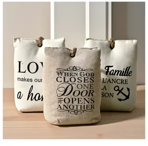 Fabric door stopper set with printed text quotes and rustic rope handle for home decor.