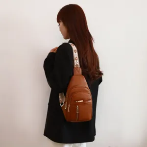 Bruine PU lederen borsttas voor dames casual crossbody tas met brede geweven schouderband