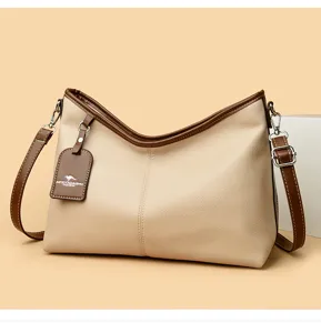 Elegante dames schoudertas van zacht PU leer in beige met bruine riem voor dagelijks model 2025
