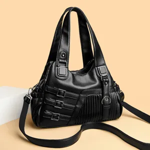 Elegante schwarze Damen Umhängetasche aus weichem Leder lässige Handtasche mit Metall-Schnallen.