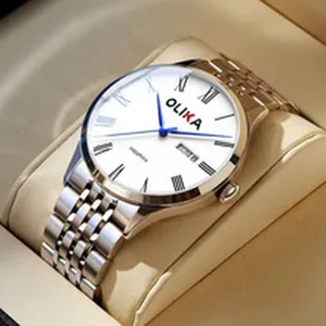 Men quartz watch detail shot featuring white dial roman numerals stainless steel metal band.