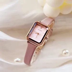 Elegant women's quartz watch with a chic square pink dial and soft leather strap.