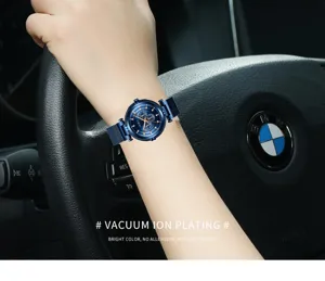 Detail view of a stylish women quartz watch with blue dial and magnetic mesh strap.
