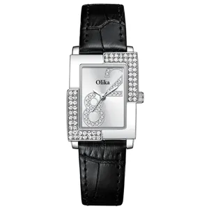 Fashion women's rhinestone quartz watch with black leather strap and rectangular dial.