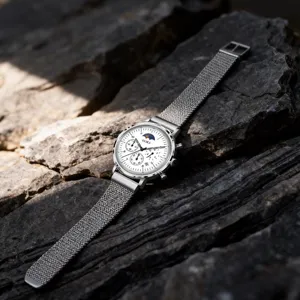 Men's quartz watch with silver mesh strap, white dial, moon phase and chronograph features.