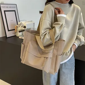 Casual large capacity canvas tote bag for women, vintage shoulder crossbody bag with multi pockets.