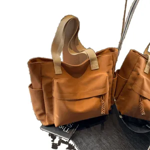 Vintage canvas tote bag for women, large capacity casual shoulder bag and commuter handbag.