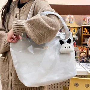 Casual solid color large capacity shoulder tote bag for women, commuter student handbag.
