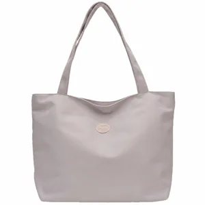 Solid color casual minimalist shoulder tote bag, large capacity daily commuting student bag.
