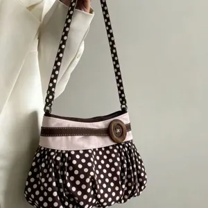Retro polka dot shoulder underarm bag for women, cute pleated cloud handbag with wooden button daily.
