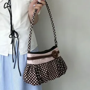 Retro polka dot underarm shoulder bag with pleated cloud design and cute wooden button accent.