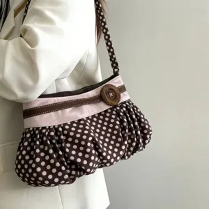 Retro polka dot underarm bag with cute cloud shape, wooden button accent and sweet style.
