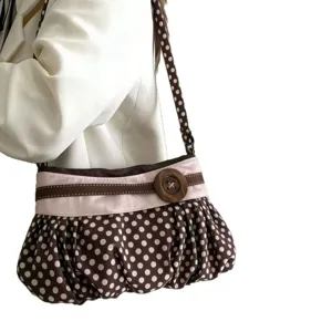 Retro polka dot underarm bag with pleated cloud design and cute wooden button for daily wear.