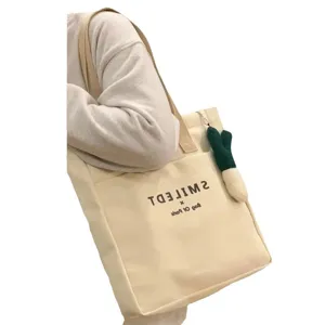 Casual canvas tote bag for women, large capacity shoulder bag for daily commute and school.