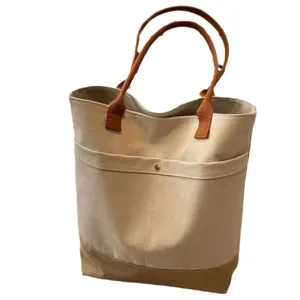 Large capacity canvas tote bag, versatile commuting shoulder bag for work and daily student use.