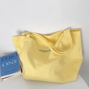Yellow canvas tote bag casual shoulder handbag simple student casual shopping bag aesthetic.