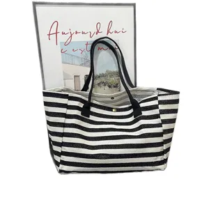 Black and white striped canvas tote bag, large capacity shoulder bag for women daily commute.