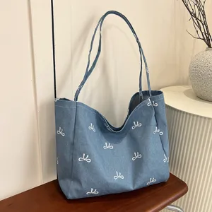 Blue denim canvas tote bag for women with cute white bow print, large capacity casual shoulder bag