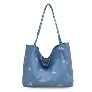 Casual blue denim tote bag for women with cute white bow print, large capacity shoulder bag.