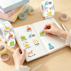 Close-up detail view of cute cartoon animal reward sticker roll set in use on a notebook.