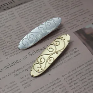Detailed view of french retro niche design palace embossed hair clip, elegant metal side barrette.