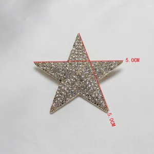Gold-toned star brooch sparkling with clear rhinestones elegant suit accessory 5cm size