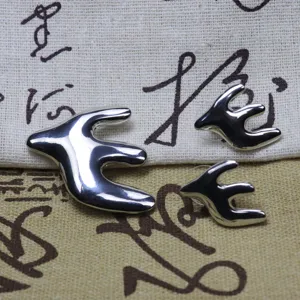 Silver swallow bird brooch and earrings set, elegant metal jewelry accessory for women daily wear.
