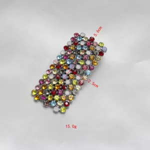 Detailed view of a colorful crystal rhinestone duckbill hair clip, elegant hair accessory.