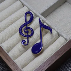 Blue gold enamel music note brooch set, elegant music student lapel pin jewelry accessory.